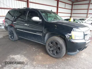 2009 Chevrolet Tahoe LTZ z VIN 1GNFK330X9R219064, wystawiony jako IAAI lot #42261154 z przebiegiem 125 511 mil mil oraz . Historia ofert i sprzedaży dostępna na DreamBid. Obrazek 1.