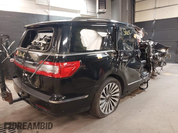 2019 Lincoln Navigator Reserve with VIN 5LMJJ2LT2KEL00267, listed as a IAAI auction lot 42079217 with 77,965 mi miles and . Bid and sale history available at DreamBid. Image 4.