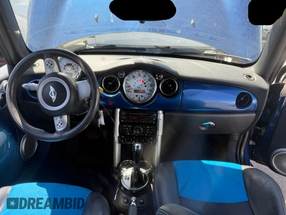 2007 MINI Convertible z VIN WMWRF33577TG17466, wystawiony jako Copart lot #58196905 z przebiegiem 60 644 mil mil oraz Tytuł czysty. Historia ofert i sprzedaży dostępna na DreamBid. Obrazek 9.