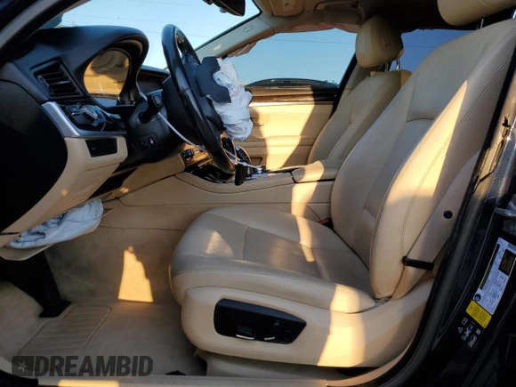 2015 BMW 5 Series 528i xDrive with VIN WBA5A7C58FG143147, listed as a Copart auction lot 52850195 with 130,528 mi miles and Salvage Title. Bid and sale history available at carsss.com. Image 7.
