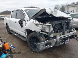 2017 Nissan Titan SL z VIN 1N6AA1E51HN518710, wystawiony jako IAAI lot #41123326 z przebiegiem 100 514 mil mil oraz . Historia ofert i sprzedaży dostępna na DreamBid. Obrazek 1.