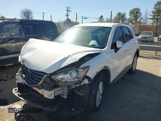 2016 Mazda CX-5 Sport with VIN JM3KE2BY9G0890587, listed as a IAAI auction lot 41685344 with 91,190 mi miles. Bid and sale history available at carsss.com. Image 17.