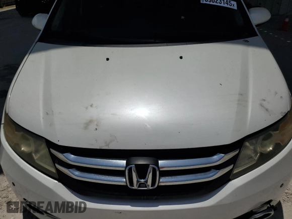 2014 Honda Odyssey Touring z VIN 5FNRL5H9XEB123330, wystawiony jako Copart lot #59023145 z przebiegiem 118 371 mil mil oraz Nie do naprawy • Non repairable. Historia ofert i sprzedaży dostępna na DreamBid. Obrazek 12.
