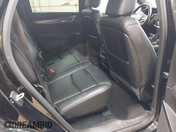 2022 Cadillac XT5 FWD Luxury with VIN 1GYKNAR47NZ100356, listed as a IAAI auction lot 42393314 with 91,492 mi miles and . Bid and sale history available at DreamBid. Image 8.