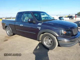 1999 Ford F-150 XL with VIN 1FTRX17L4XKA58054, listed as a IAAI auction lot 41647530 with 225,632 mi miles. Bid and sale history available at carsss.com. Image 1.