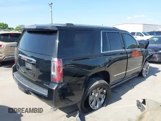 2016 GMC Yukon Denali with VIN 1GKS2CKJ4GR110747, listed as a IAAI auction lot 41876778 with 1 mi miles. Bid and sale history available at carsss.com. Image 4.