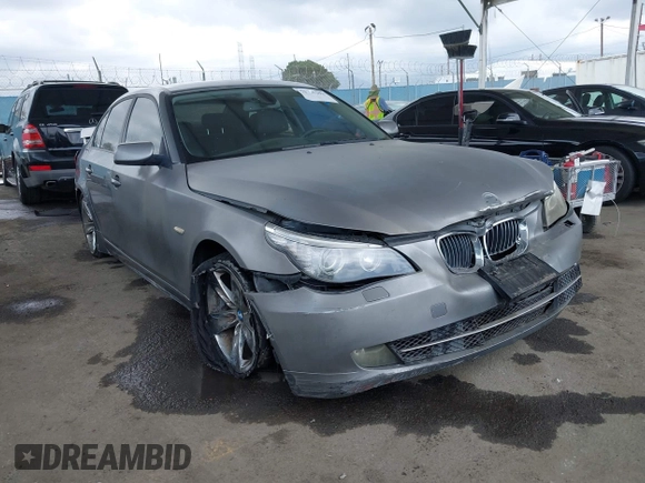 2010 BMW 5 Series 528i with VIN WBANU5C56AC127797, listed as a IAAI auction lot 42128290 with 137,578 mi miles and . Bid and sale history available at carsss.com. Image 1.