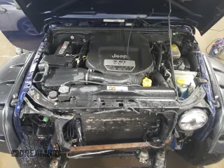 2013 Jeep Wrangler Unlimited Sport z VIN 1C4BJWDG5DL529707, wystawiony jako Copart lot #48436325 z przebiegiem 142 661 mil mil oraz Szkoda całkowita • Salvage title. Historia ofert i sprzedaży dostępna na DreamBid. Obrazek 11.