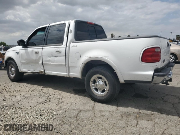 2002 Ford F-150 XLT with VIN 1FTRW07L52KA04929, listed as a Copart auction lot 54491815 with 169,132 mi miles and Salvage Title. Bid and sale history available at carsss.com. Image 2.