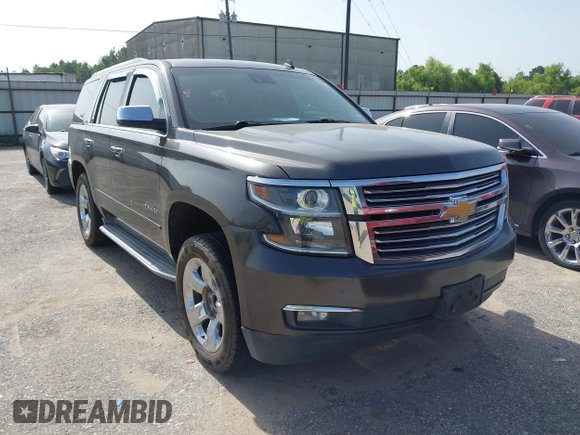 2015 Chevrolet Tahoe LTZ with VIN 1GNSCCKC2FR170090, listed as a IAAI auction lot 42616452 with 249,940 mi miles and . Bid and sale history available at DreamBid. Image 1.