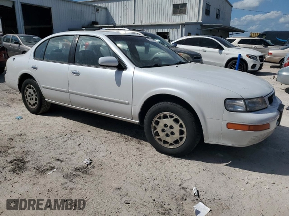 1995 Nissan Maxima GLE с VIN JN1CA21D6ST059369, выставлен на аукционе Copart как лот 74794884 с пробегом 246 806 миль миль и Списание • Salvage title. История ставок и продаж доступна на DreamBid. Изображение 4.