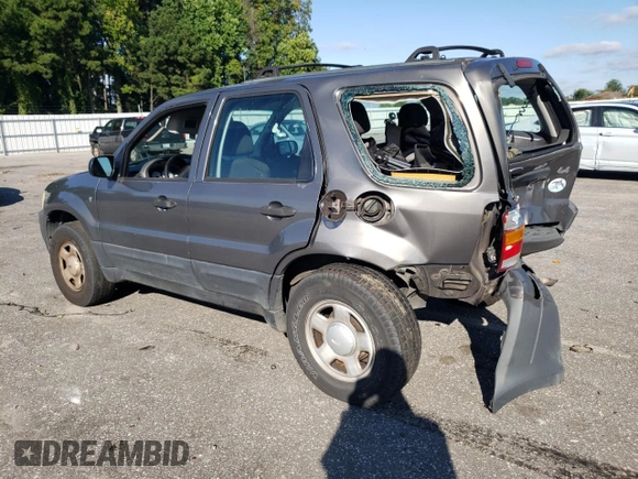 2004 Ford Escape XLS with VIN 1FMYU92134KA21707, listed as a Copart auction lot 72114804 with 219,518 mi miles and Salvage Title. Bid and sale history available at DreamBid. Image 2.