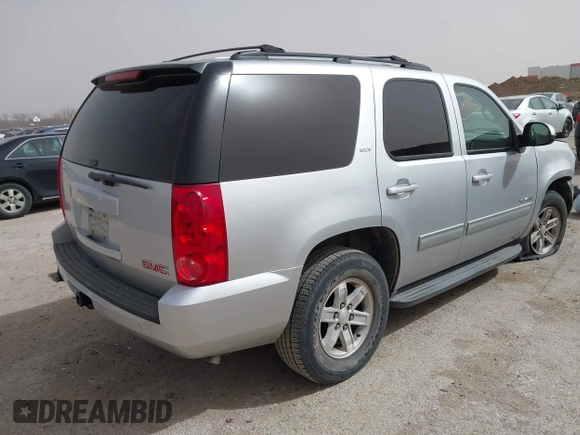 2014 GMC Yukon SLT with VIN 1GKS1CE02ER204452, listed as a IAAI auction lot 41804400 with 176,265 mi miles. Bid and sale history available at carsss.com. Image 4.