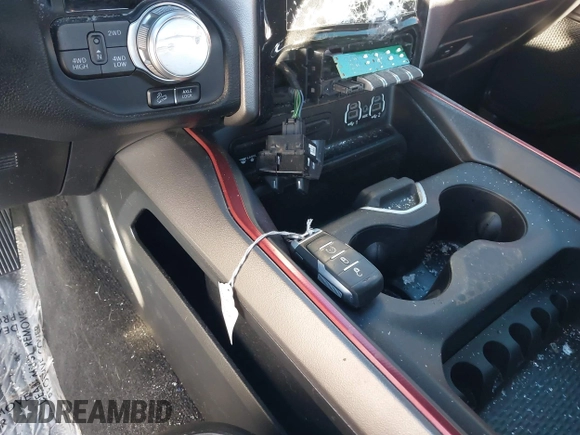 2019 Ram 1500 Rebel z VIN 1C6SRFLT2KN900600, wystawiony jako IAAI lot #41307832 z przebiegiem 74 481 mil mil oraz . Historia ofert i sprzedaży dostępna na DreamBid. Obrazek 11.