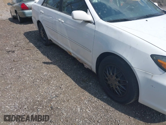 2003 Toyota Camry LE with VIN JTDBE32K830222476, listed as a IAAI auction lot 42160720 with 161,570 mi miles and . Bid and sale history available at DreamBid. Image 14.