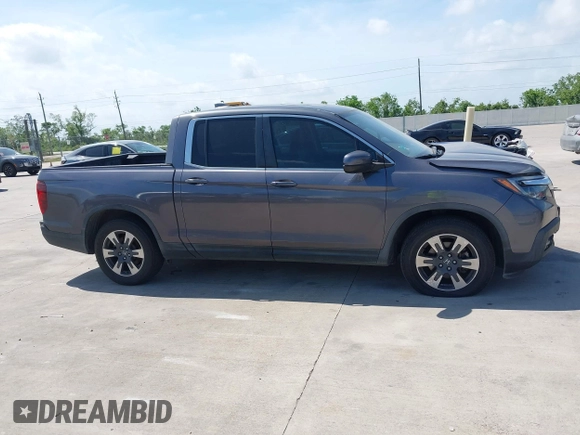 2019 Honda Ridgeline RTL with VIN 5FPYK2F59KB004653, listed as a IAAI auction lot 42066778 with 90,144 mi miles and . Bid and sale history available at DreamBid. Image 13.