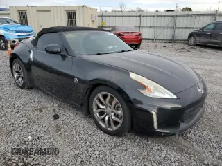 2014 Nissan 370Z Touring with VIN JN1AZ4FHXEM621358, listed as a Copart auction lot 84832164 with 65,441 mi miles and Salvage Title. Bid and sale history available at DreamBid. Image 4.