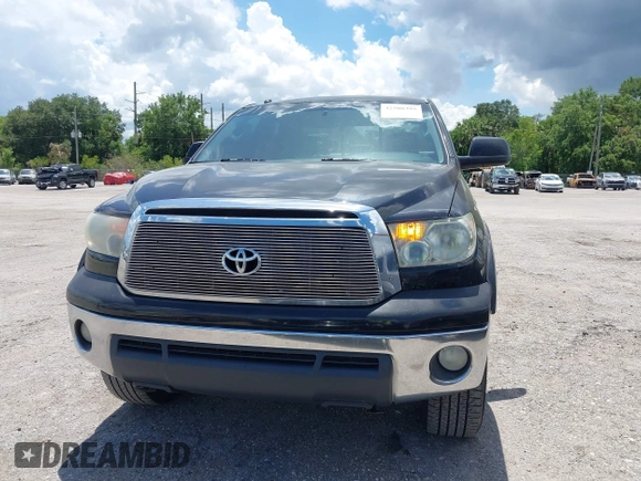 2012 Toyota Tundra z VIN 5TFRY5F17CX128888, wystawiony jako IAAI lot #42508395 z przebiegiem 279 524 mil mil oraz . Historia ofert i sprzedaży dostępna na DreamBid. Obrazek 12.