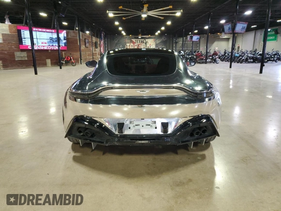2020 Aston Martin Vantage z VIN SCFSMGAW1LGN03414, wystawiony jako Copart lot #84055064 z przebiegiem 24 509 mil mil oraz Szkody całkowita. Historia ofert i sprzedaży dostępna na DreamBid. Obrazek 4.