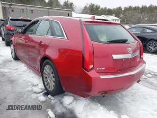 2010 Cadillac CTS with VIN 1G6DE8EG8A0130569, listed as a IAAI auction lot 41609081 with 113,174 mi miles and . Bid and sale history available at DreamBid. Image 3.
