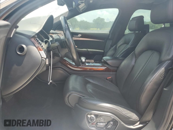 2013 Audi A8 6.3L with VIN WAUR4AFD1DN010893, listed as a Copart auction lot 62693655 with 115,085 mi miles and Salvage title. Bid and sale history available at DreamBid. Image 7.