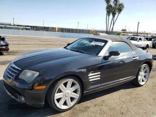 2005 Chrysler Crossfire Limited z VIN 1C3AN65L55X040010, wystawiony jako Copart lot #69325134 z przebiegiem 98 534 mil mil oraz Czysty tytuł • Clean title. Historia ofert i sprzedaży dostępna na DreamBid. Obrazek 1.