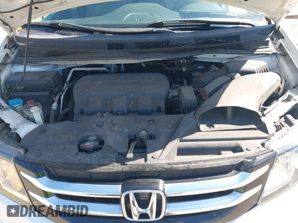 2015 Honda Odyssey Touring Elite with VIN 5FNRL5H91FB038099, listed as a IAAI auction lot 41829649 with 167,017 mi miles and . Bid and sale history available at DreamBid. Image 10.