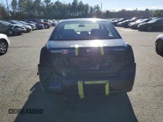 2006 Suzuki Forenza z VIN KL5JD56ZX6K278029, wystawiony jako Copart lot #82026904 z przebiegiem 117 700 mil mil oraz Szkody całkowita. Historia ofert i sprzedaży dostępna na DreamBid. Obrazek 6.
