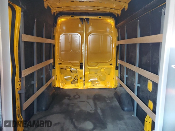 2022 Ford Transit Cargo z VIN 1FTBR1X85NKA42773, wystawiony jako Copart lot #57188295 z przebiegiem 59 108 mil mil oraz Szkody całkowita. Historia ofert i sprzedaży dostępna na DreamBid. Obrazek 10.