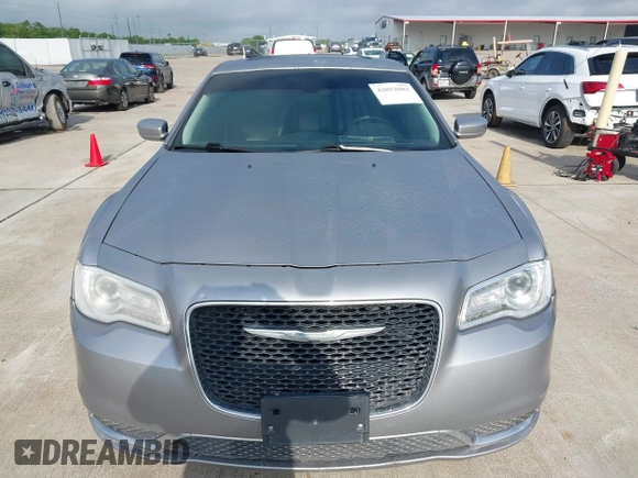 2016 Chrysler 300 Anniversary Edition with VIN 2C3CCAAG9GH211875, listed as a IAAI auction lot 42052083 with 209,251 mi miles and . Bid and sale history available at DreamBid. Image 12.