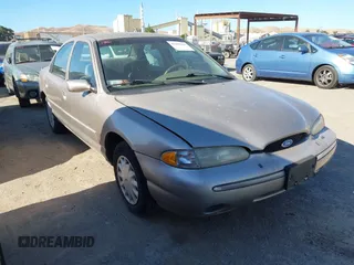 1995 Ford Contour LX z VIN 1FALP6536SK194464, wystawiony jako IAAI lot #42305265 z przebiegiem 217 353 mil mil oraz . Historia ofert i sprzedaży dostępna na DreamBid. Obrazek 1.