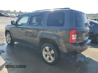 2014 Jeep Patriot Latitude with VIN 1C4NJRFB1ED847612, listed as a Copart auction lot 62721605 with 126,268 mi miles and Salvage title. Bid and sale history available at DreamBid. Image 2.