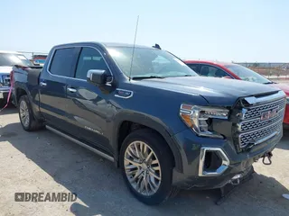 2019 GMC Sierra 1500 Denali z VIN 1GTU9FEL5KZ387012, wystawiony jako IAAI lot #42002743 z przebiegiem 124 718 mil mil oraz . Historia ofert i sprzedaży dostępna na DreamBid. Obrazek 1.