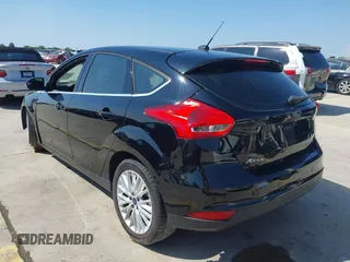 2018 Ford Focus Titanium with VIN 1FADP3N21JL289677, listed as a IAAI auction lot 42183812 with Not provided miles and . Bid and sale history available at DreamBid. Image 3.