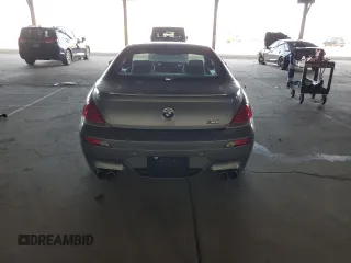 2006 BMW M6 with VIN WBSEH934X6B797428, listed as a Copart auction lot 63462135 with 73,393 mi miles and Salvage title. Bid and sale history available at DreamBid. Image 6.