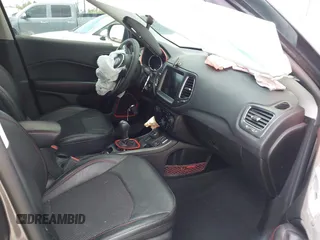 2021 Jeep Compass Trailhawk with VIN 3C4NJDDB6MT561074, listed as a IAAI auction lot 42125886 with 77,293 mi miles and . Bid and sale history available at DreamBid. Image 5.