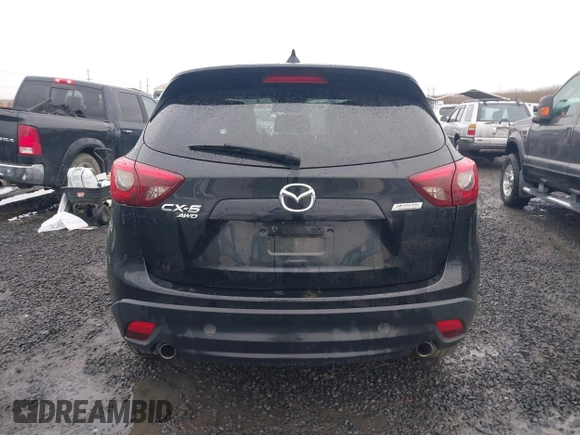 2016 Mazda CX-5 Grand Touring z VIN JM3KE4DY5G0742686, wystawiony jako IAAI lot #41598719 z przebiegiem 117 643 mil mil oraz . Historia ofert i sprzedaży dostępna na DreamBid. Obrazek 17.