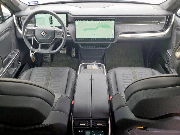 2024 Rivian R1S Adventure z VIN 7PDSGABAXRN035556, wystawiony jako Copart lot #59114065 z przebiegiem 9119 mil mil oraz Szkody całkowita. Historia ofert i sprzedaży dostępna na DreamBid. Obrazek 8.
