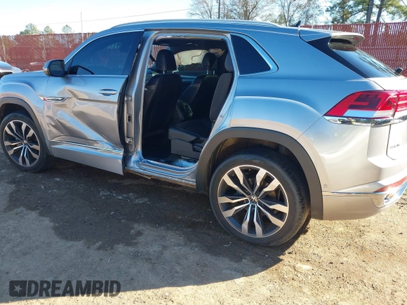 2022 Volkswagen Atlas SEL Premium R-Line with VIN 1V2FE2CA4NC218765, listed as a IAAI auction lot 41103593 with 42,008 mi miles and . Bid and sale history available at DreamBid. Image 3.