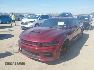 2022 Dodge Charger Scat Pack with VIN 2C3CDXGJ6NH216788, listed as a IAAI auction lot 41670744 with 48,680 mi miles and . Bid and sale history available at carsss.com. Image 17.