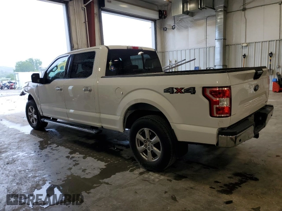 2019 Ford F-150 XL with VIN 1FTFW1E4XKFA16846, listed as a Copart auction lot 61345795 with 128,587 mi miles and Salvage title. Bid and sale history available at DreamBid. Image 2.