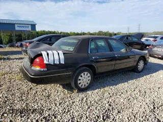 2002 Ford Crown Victoria Police with VIN 2FAFP71W52X157857, listed as a Copart auction lot 65963304 with 203,427 mi miles and Clean Title. Bid and sale history available at carsss.com. Image 3.