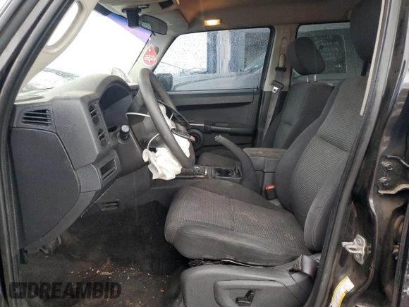 2008 Jeep Commander Sport with VIN 1J8HH48K88C183076, listed as a Copart auction lot 56365665 with 213,270 mi miles and Salvage title. Bid and sale history available at DreamBid. Image 7.