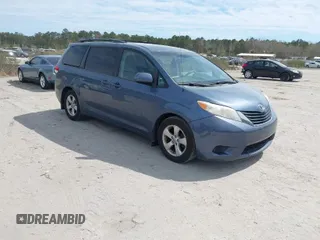 2014 Toyota Sienna LE AAS with VIN 5TDKK3DCXES498110, listed as a IAAI auction lot 41847116 with 242,065 mi miles. Bid and sale history available at carsss.com. Image 1.