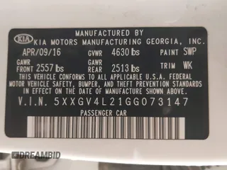 2016 Kia Optima SXL Turbo with VIN 5XXGV4L21GG073147, listed as a IAAI auction lot 41504517 with 130,467 mi miles. Bid and sale history available at carsss.com. Image 9.