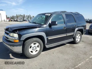 2004 Chevrolet Tahoe LS with VIN 1GNEC13V94R266149, listed as a Copart auction lot 50634985 with 147,194 mi miles and Salvage title. Bid and sale history available at DreamBid. Image 1.