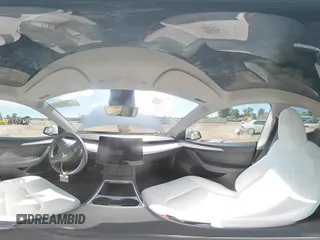 2023 Tesla Model Y Long Range with VIN 7SAYGAEE6PF795434, listed as a Copart auction lot 67507984 with 24,469 mi miles and Salvage Title. Bid and sale history available at DreamBid. Image 13.