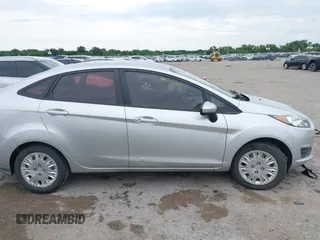 2015 Ford Fiesta S with VIN 3FADP4AJ0FM145594, listed as a IAAI auction lot 42368055 with 142,169 mi miles and . Bid and sale history available at DreamBid. Image 13.