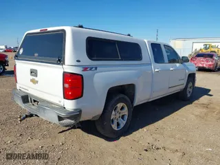 2015 Chevrolet Silverado 1500 LT with VIN 1GCVKREC7FZ209330, listed as a IAAI auction lot 40986703 with 139,383 mi miles. Bid and sale history available at carsss.com. Image 4.