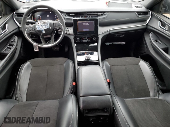 2023 Jeep Grand Cherokee Altitude with VIN 1C4RJGAG7PC573429, listed as a Copart auction lot 42961295 with 9,704 mi miles and Salvage title. Bid and sale history available at DreamBid. Image 8.